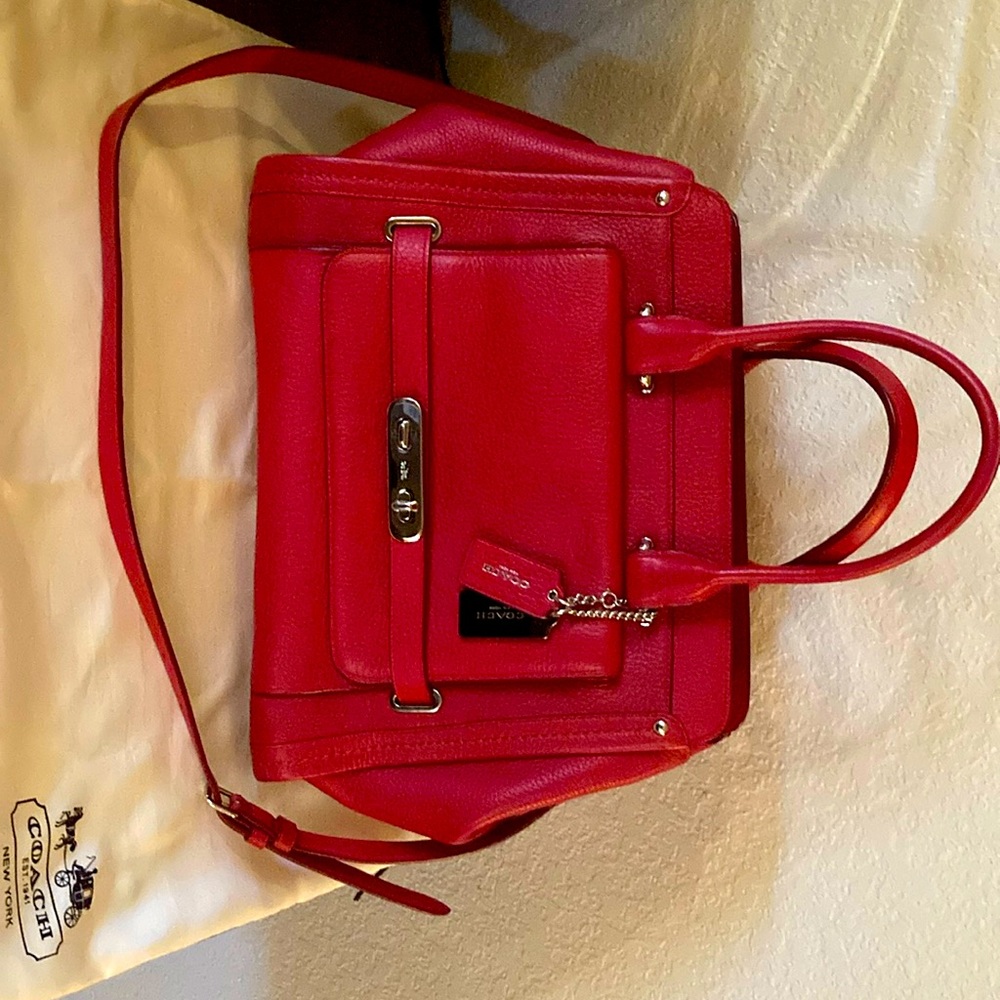 Never used, beautiful vintage red Coach bag.